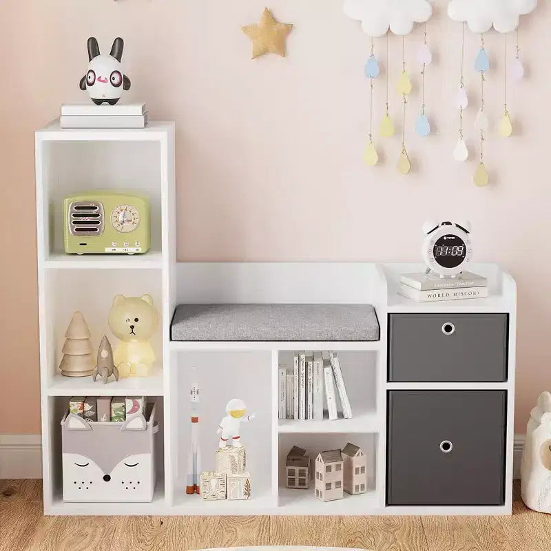 Libreria per bambini con larghezza di 112 cm, 6 scomparti, 2 cassetti, cuscino per seduta e organizer per giocattoli – Bianca