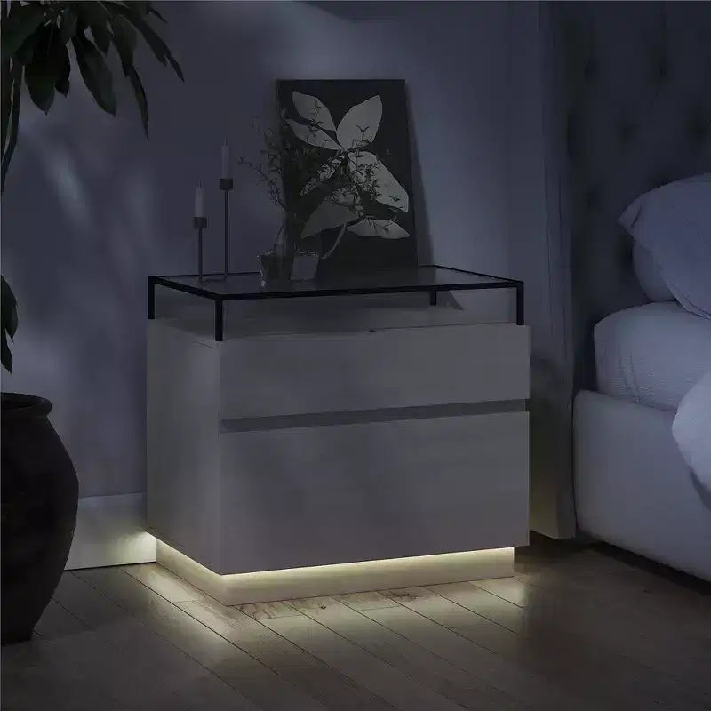 Comodino a 2 cassetti con base a LED e piano in vetro